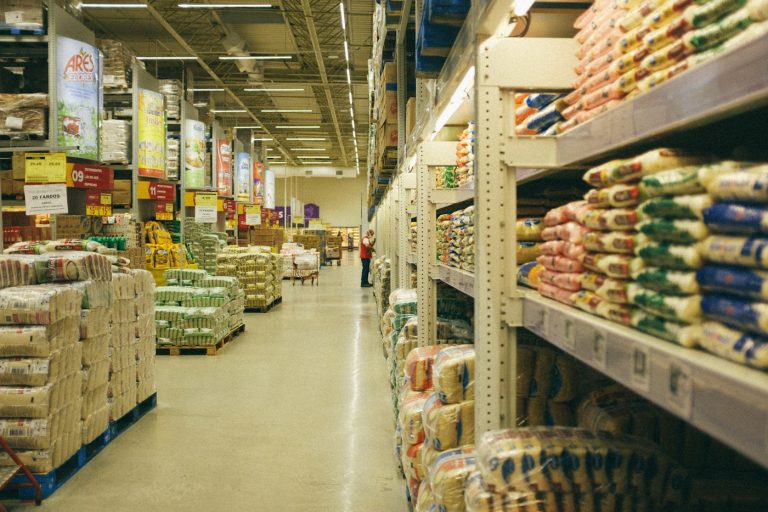 Shelves and sacks of assorted food products